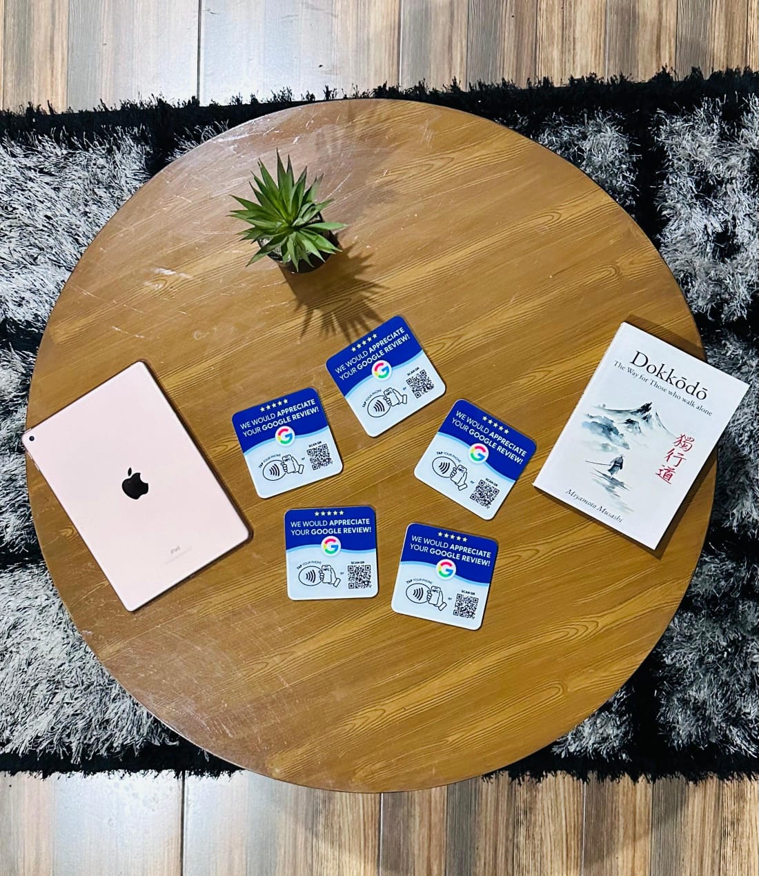 TapFlow Google review cards displayed on a table